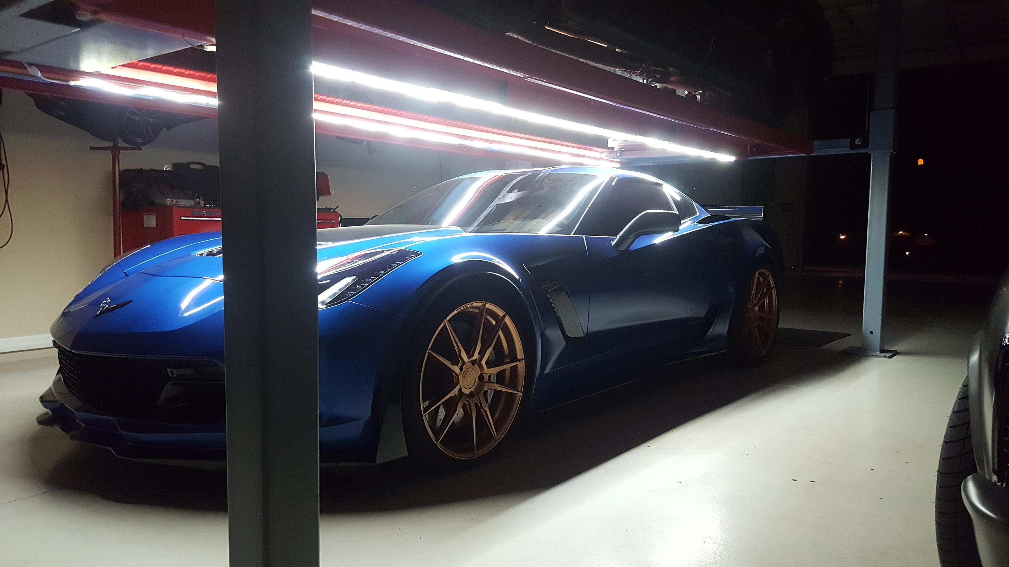 4 Post Light Kit 13.5 foot installed on lift with Corvette